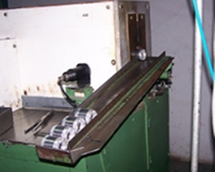 Motor rotor shaft hot mounting equipment